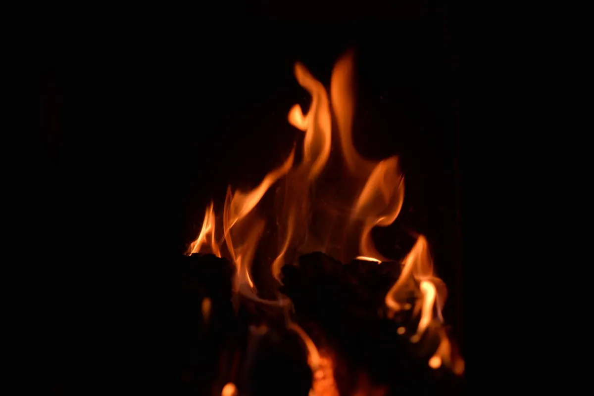 How to Safely Light and Maintain a Real Fire
